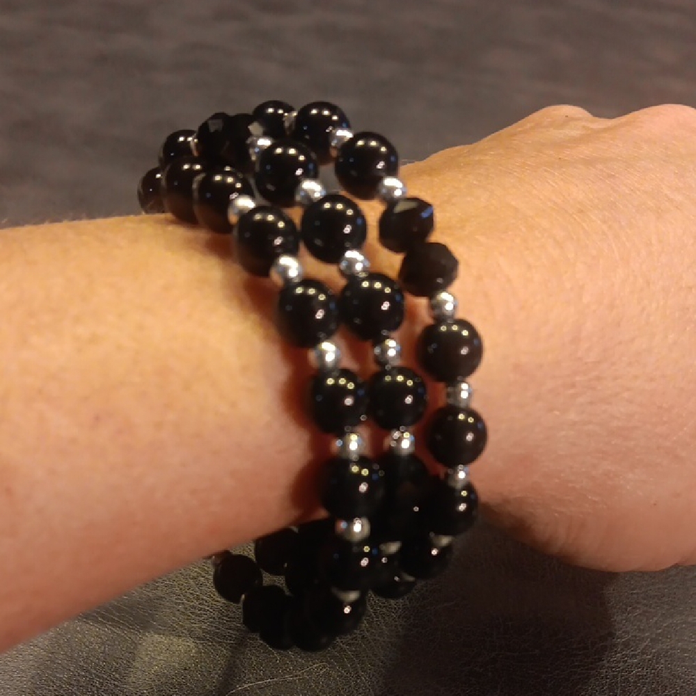 Beautiful Black Beaded Memory Wire Bracelet With Silver Spacers